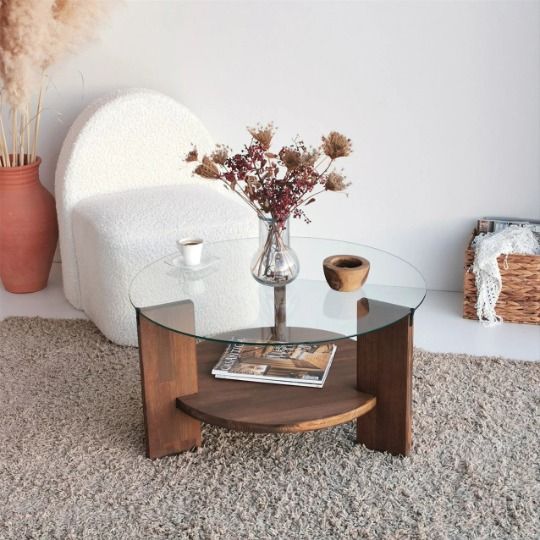 "طاولة وسط فاخرة مصنوعة من زجاج مقوى وخشب زان أصيل، تصميم دائري عصري يجمع بين الفخامة والمتانة – Trompé glass et bois hâter, design circulaire moderne alliant élégance et robustesse, idéale pour le salon ou le séjour"