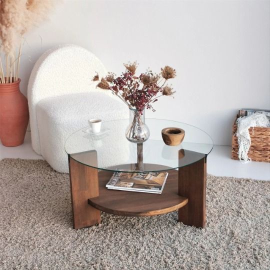 "طاولة وسط فاخرة مصنوعة من زجاج مقوى وخشب زان أصيل، تصميم دائري عصري يجمع بين الفخامة والمتانة – Trompé glass et bois hâter, design circulaire moderne alliant élégance et robustesse, idéale pour le salon ou le séjour"